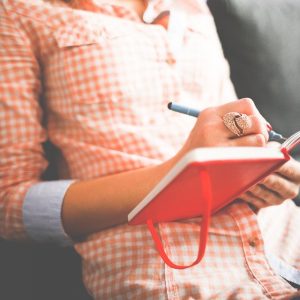 woman journaling e1544551335556