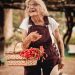 old woman with flower basket
